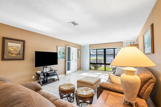 living room featuring light tile patterned flooring