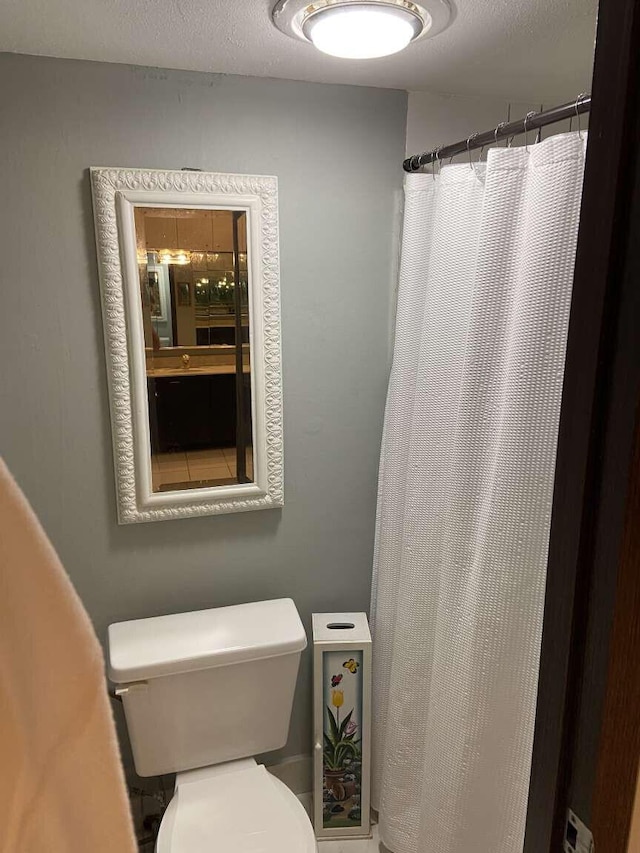 bathroom featuring toilet