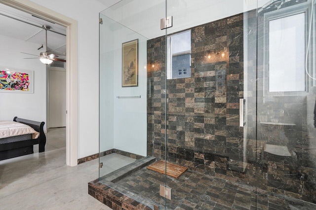 bathroom featuring ceiling fan and walk in shower