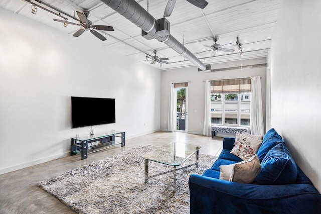 living room featuring ceiling fan