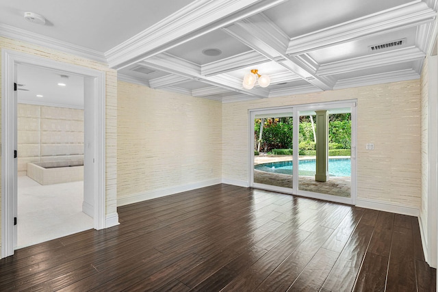 empty room with coffered ceiling, beam ceiling, dark wood-type flooring, and crown molding