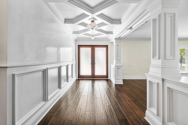 entrance foyer featuring beam ceiling, french doors, coffered ceiling, ornate columns, and dark hardwood / wood-style flooring