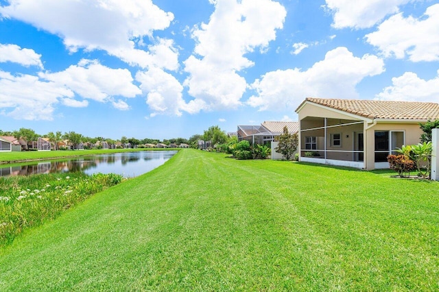 view of yard with a water view