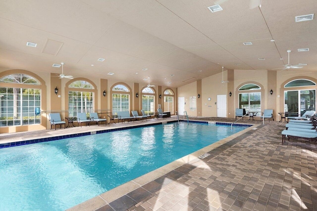 view of pool featuring ceiling fan