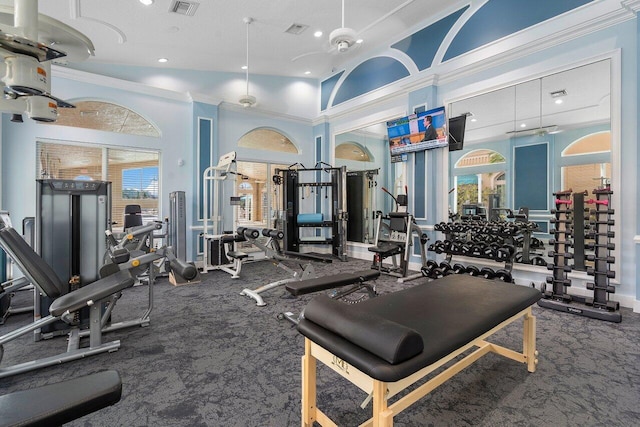 gym featuring high vaulted ceiling, a textured ceiling, and carpet flooring