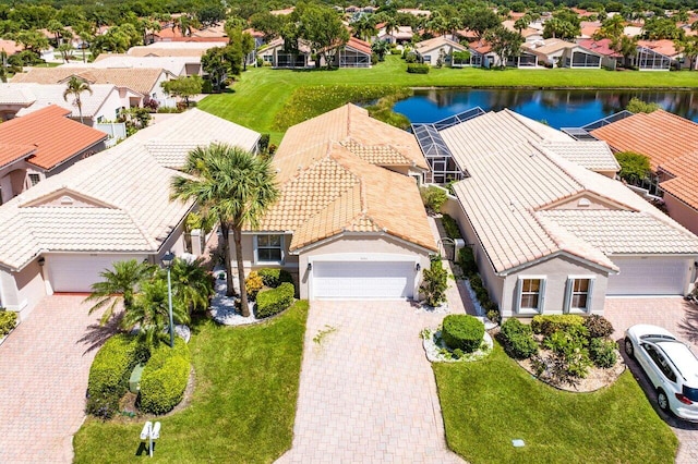 bird's eye view with a water view