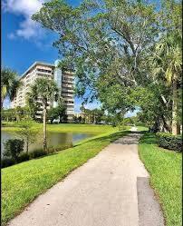 view of community featuring a yard and a water view