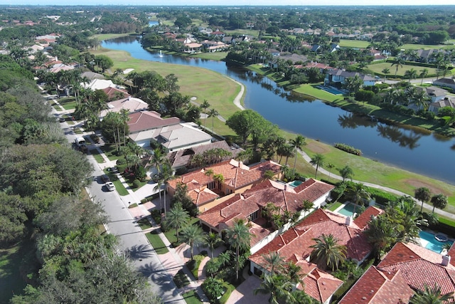 aerial view featuring a residential view, a water view, and golf course view