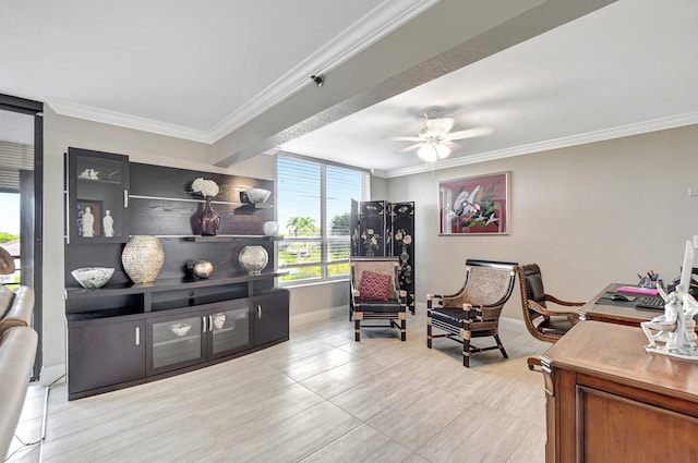 sitting room featuring ornamental molding and ceiling fan