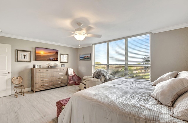 bedroom with crown molding and ceiling fan