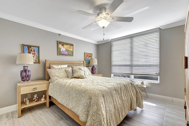 bedroom featuring ornamental molding and ceiling fan