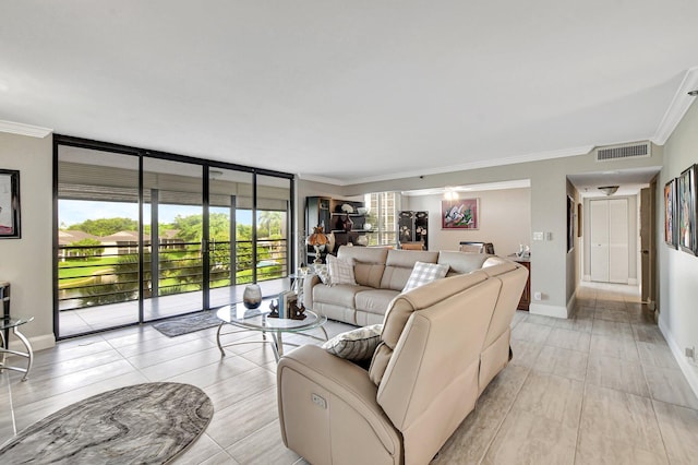 living room featuring floor to ceiling windows and ornamental molding