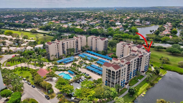 drone / aerial view with a water view