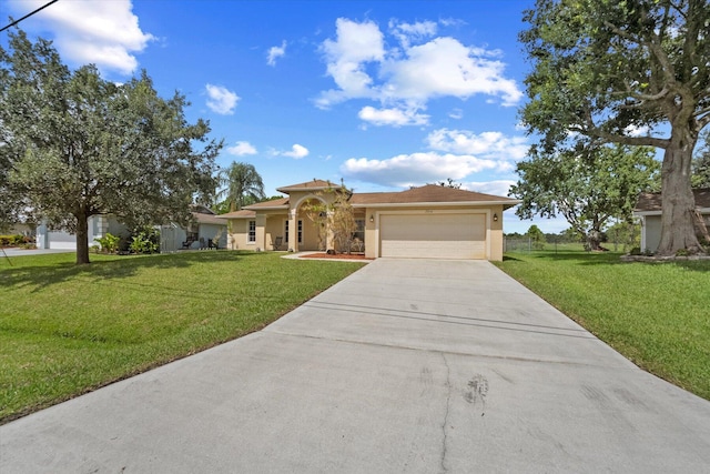 single story home featuring a front lawn and a garage