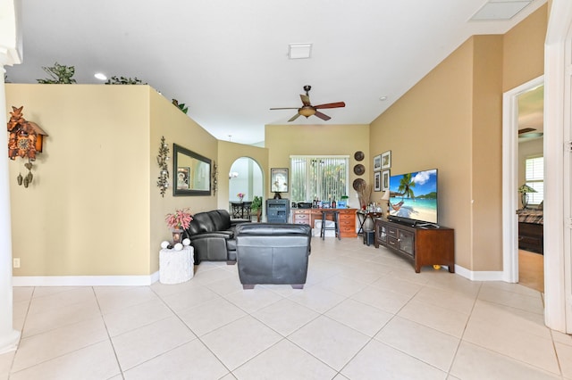 living room with ceiling fan and light tile patterned floors