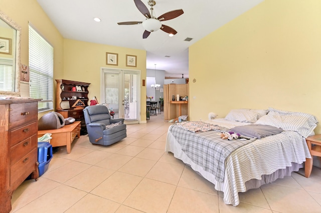 bedroom featuring french doors, light tile patterned floors, and ceiling fan