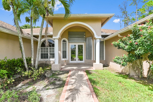 view of exterior entry with french doors