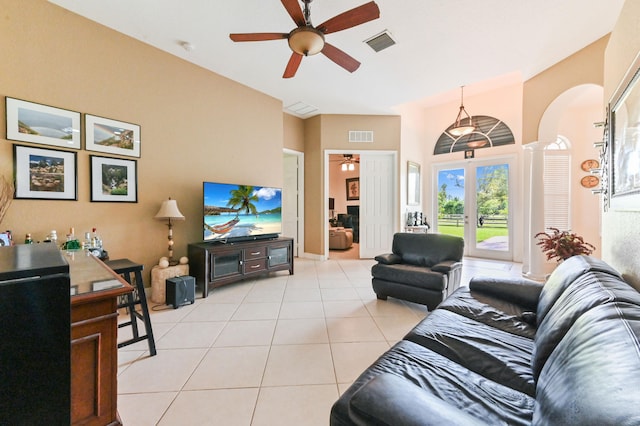 living room featuring light tile patterned flooring and ceiling fan