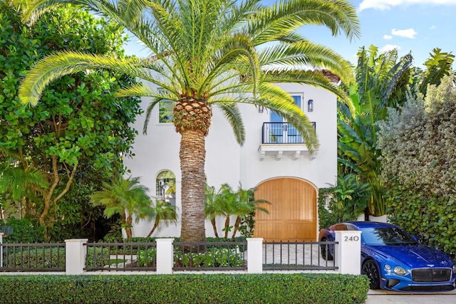 mediterranean / spanish home featuring a balcony