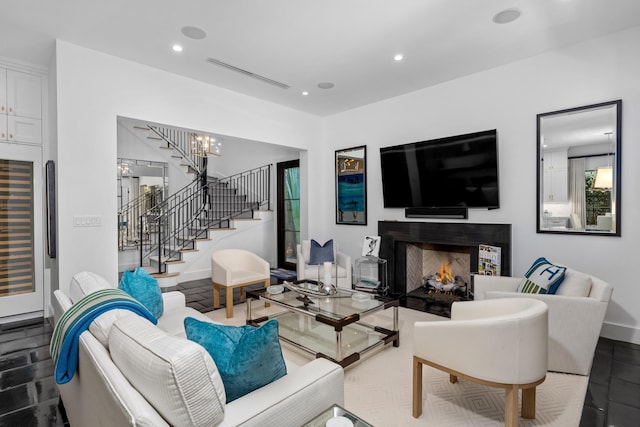 living room featuring a chandelier