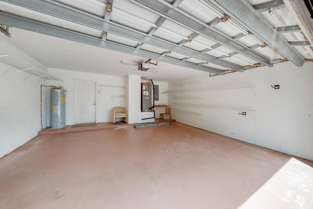 garage featuring a garage door opener and water heater