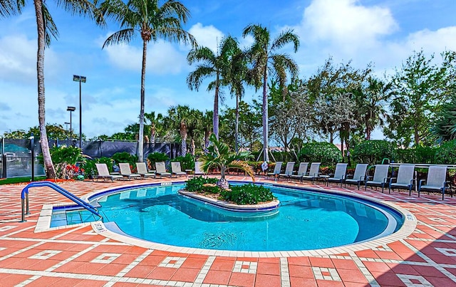 view of pool featuring a patio area