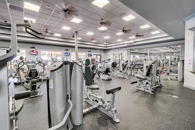 gym featuring a drop ceiling