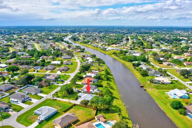 aerial view featuring a water view