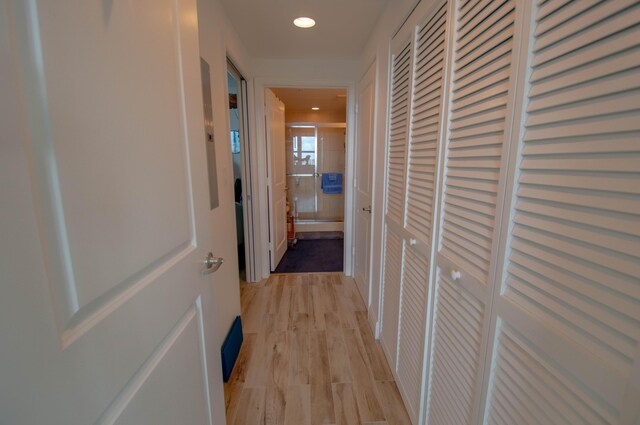 corridor featuring light wood-type flooring