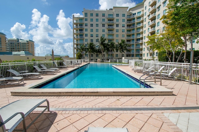 view of swimming pool featuring a patio