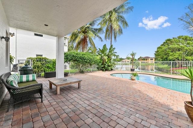 view of pool with a patio area