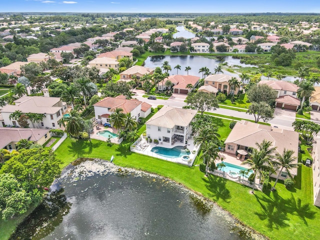 bird's eye view with a water view