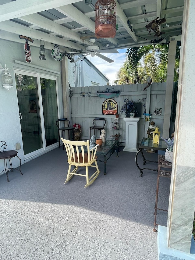 view of patio / terrace featuring ceiling fan