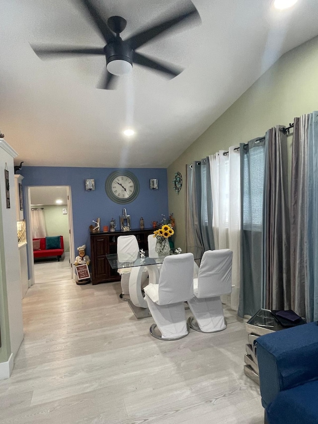 interior space featuring light hardwood / wood-style floors, ceiling fan, and lofted ceiling