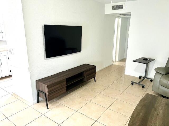 living room featuring light tile patterned floors