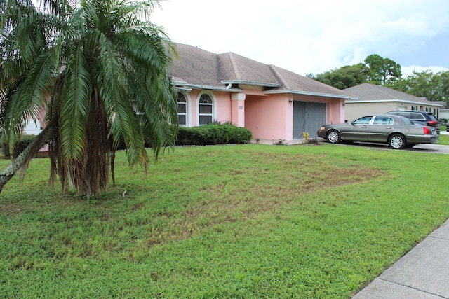 ranch-style house with a front yard