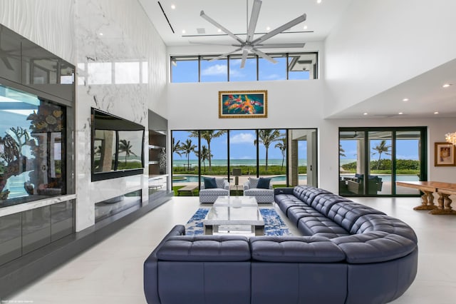 living room with a towering ceiling