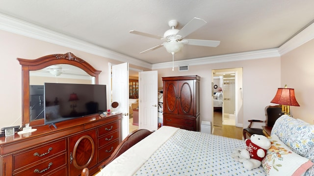 bedroom with ceiling fan, ensuite bath, hardwood / wood-style flooring, and crown molding