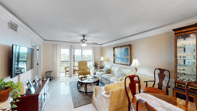 living room featuring light tile patterned floors and ceiling fan