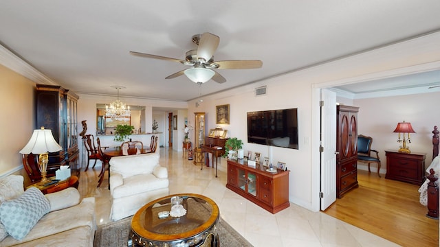 living room with light hardwood / wood-style flooring, ceiling fan with notable chandelier, and ornamental molding