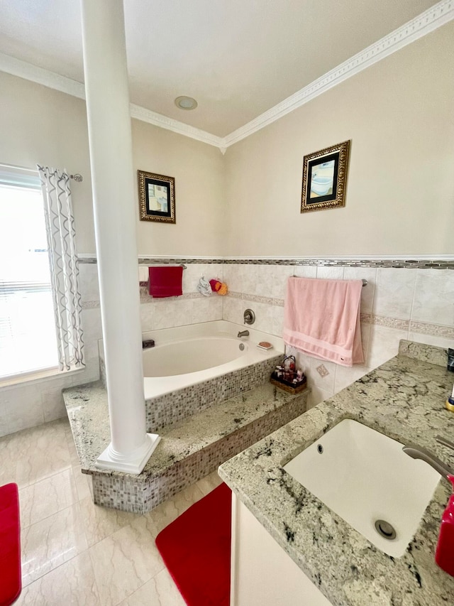 bathroom featuring vanity, tile patterned flooring, a relaxing tiled tub, crown molding, and tile walls