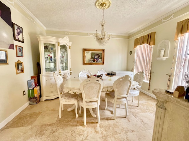 dining room featuring light tile patterned floors, ornamental molding, a textured ceiling, and a chandelier