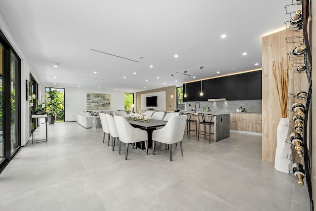 dining room featuring sink