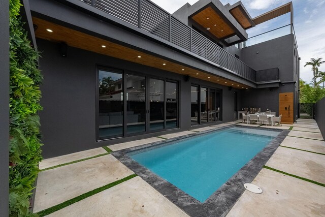 view of pool with a patio