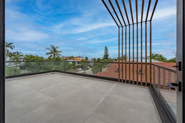 view of patio / terrace with a balcony