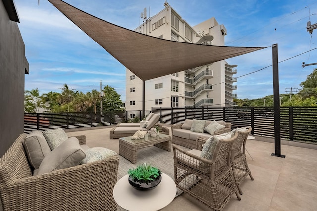 view of patio / terrace featuring a balcony and outdoor lounge area