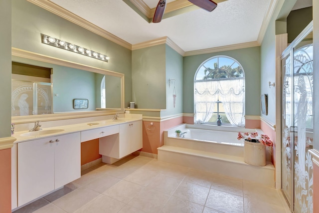 bathroom featuring ceiling fan, a bathtub, vanity, and tile patterned floors