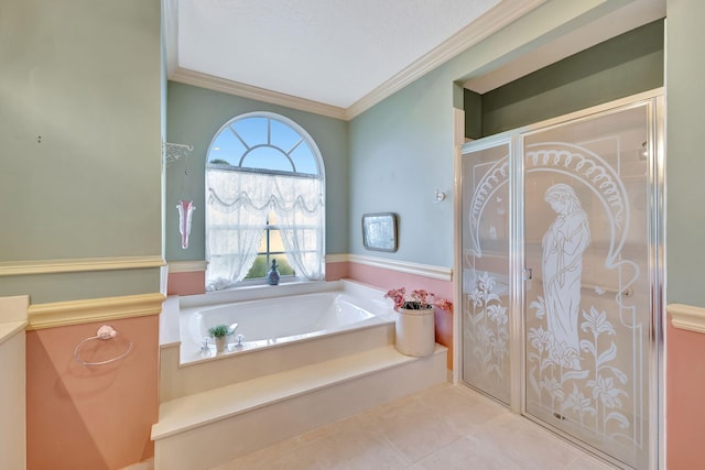 bathroom featuring tile patterned flooring, plus walk in shower, and crown molding