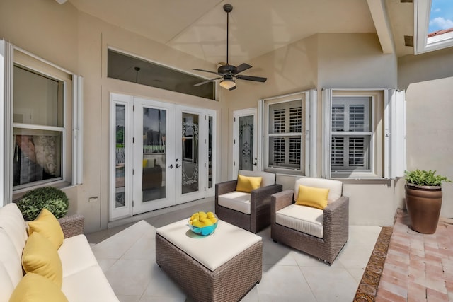 view of patio with ceiling fan, outdoor lounge area, and french doors