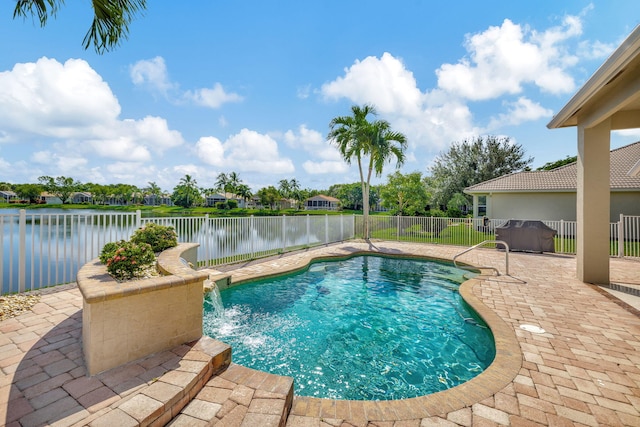 view of pool featuring a patio and pool water feature